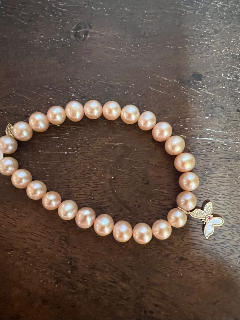 Sydney Evan Gold-Tone Pink Pearl bracelet with Butterfly Charm glinda